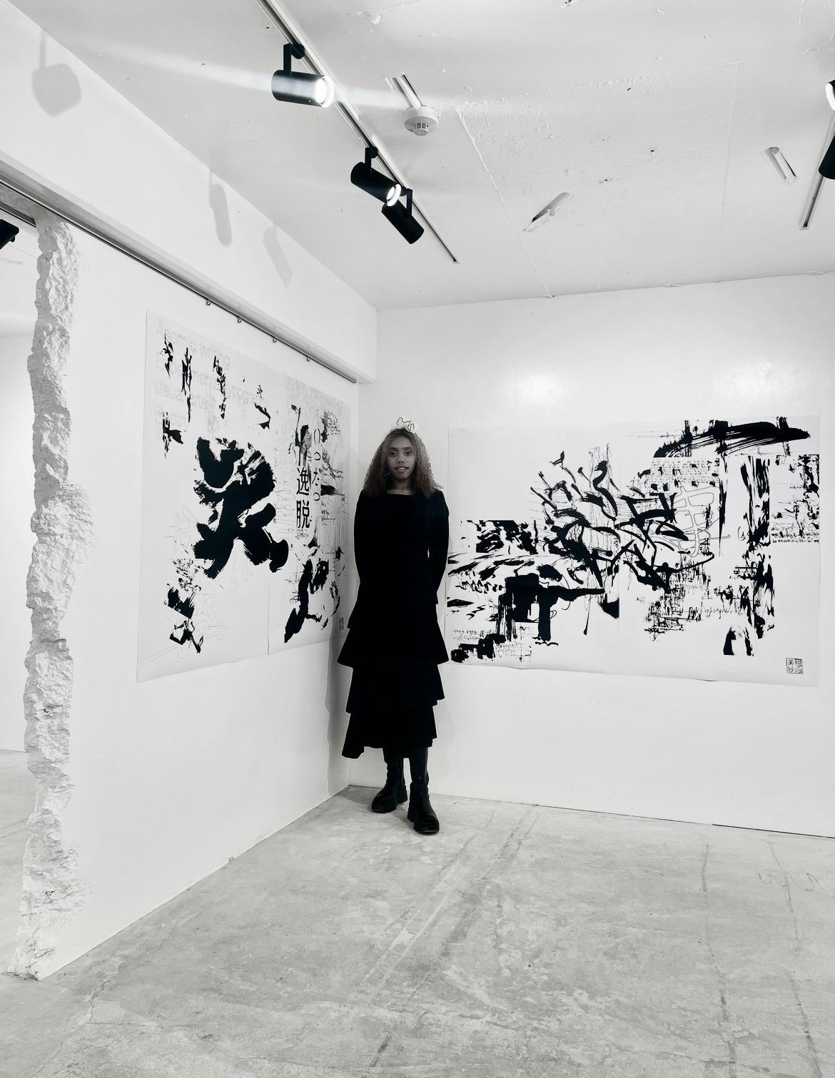Mey Amisa portrait in exhibition space