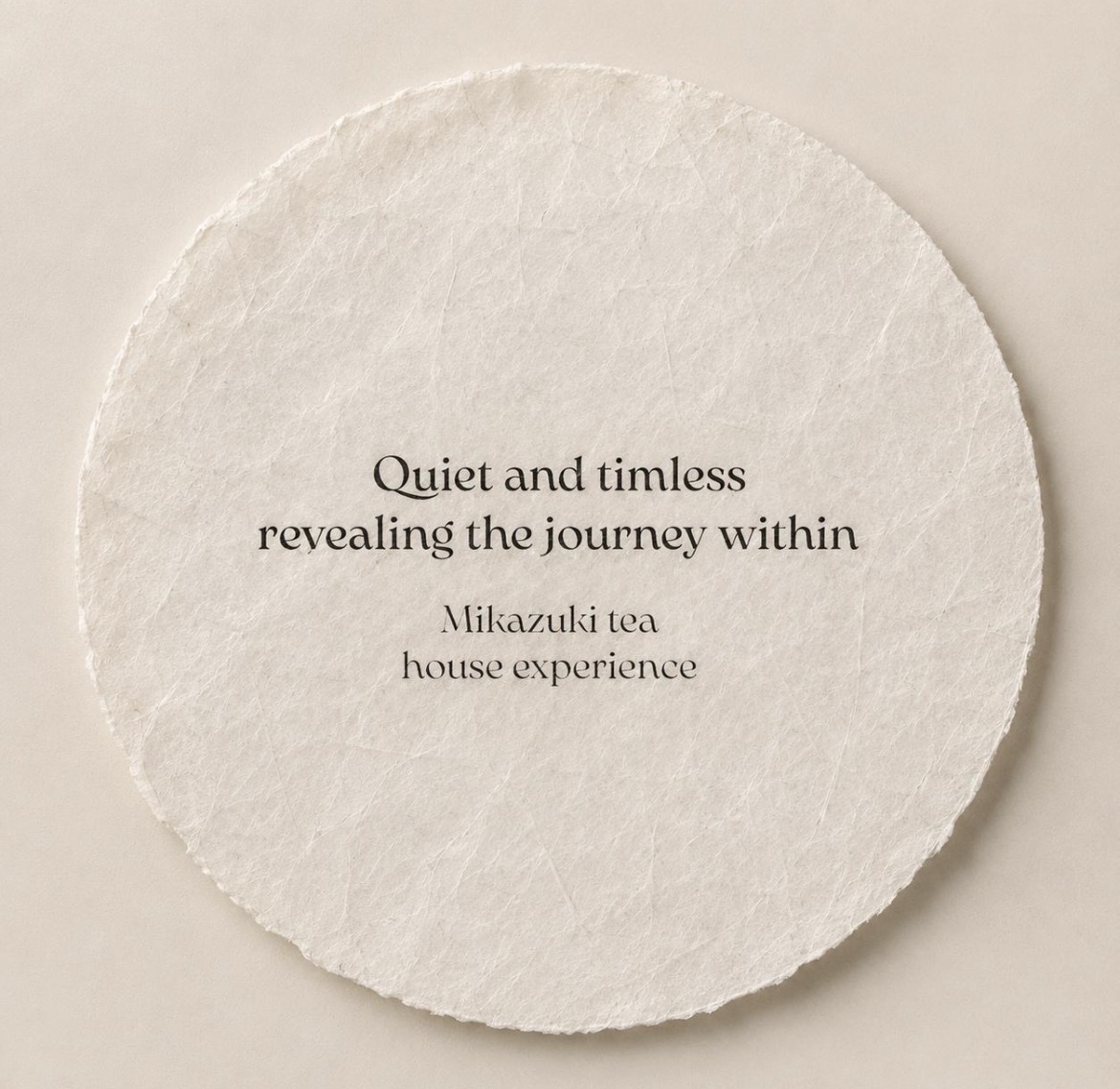 Mikazuki Tea House identity printed on a circular sheet of rice paper