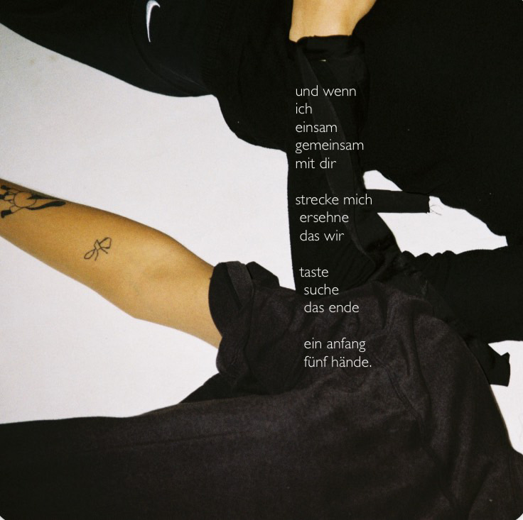 Poem printed over an abstract black-and-white composition of intertwined bodies and fabric
